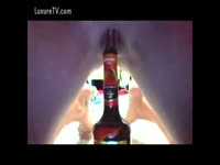 Curious teen slides her shaved cunt over class bottle for her first object insertion experience